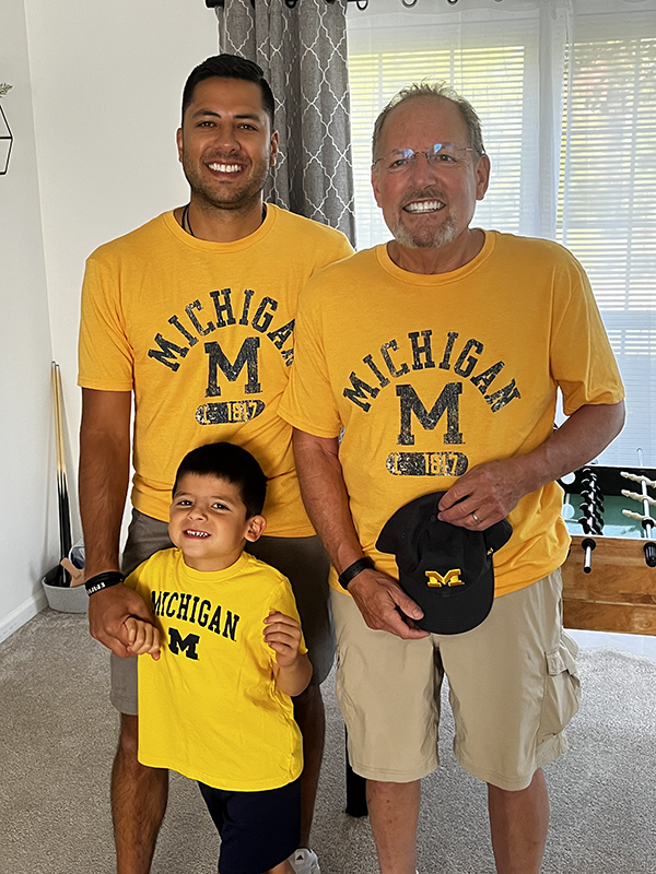 In September, the Weisman clan representatives Stuart, ’78, Joshua, ’06, and Jackson Weisman (tentatively scheduled to graduate in 2041) were ready for Maize Out on the opening day of the Wolverine football season in Ann Arbor.