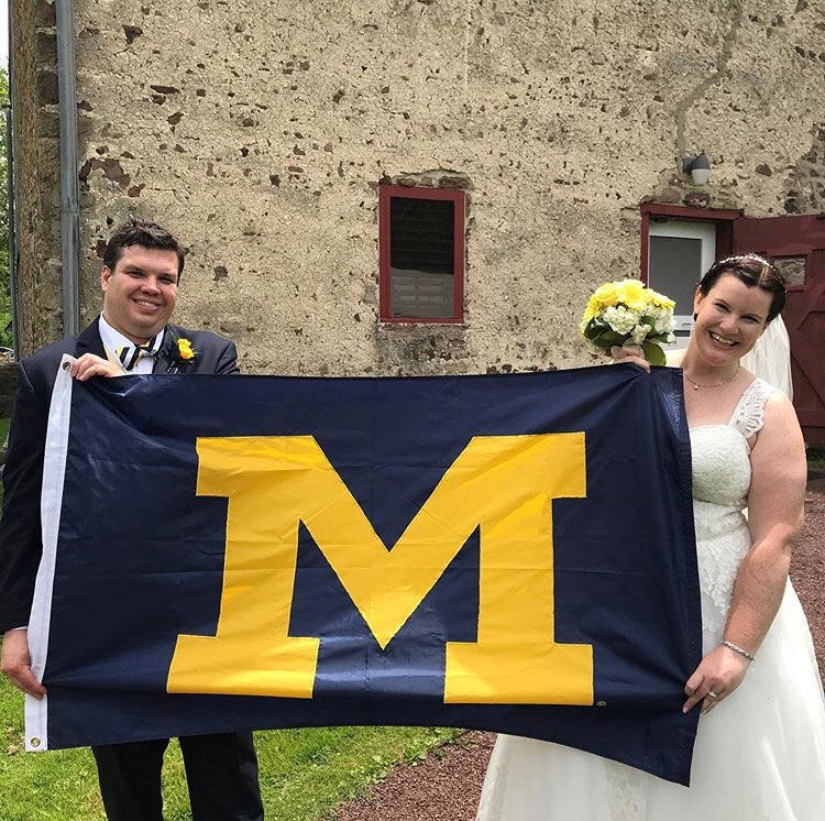 Rob, JD’06, and Jayne Melton, ’10, held their wedding reception at the Graeme Park state historic site, featuring a 19th-century barn and a 21st-century U-M flag, in August in Horsham, Penn.