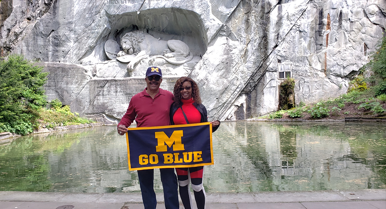 Roland Williams, ’78, and his wife, Wanda, stood in front of the Lion Monument in Lucerne, Switzerland, in May. The sculpture commemorates the Swiss Guards killed during the French Revolution in 1792.