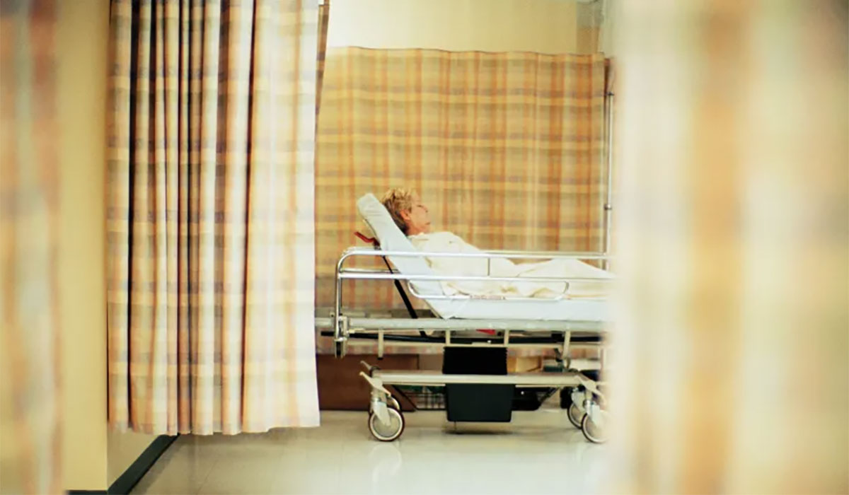 Woman Hospital Bed Hallway Curtains
