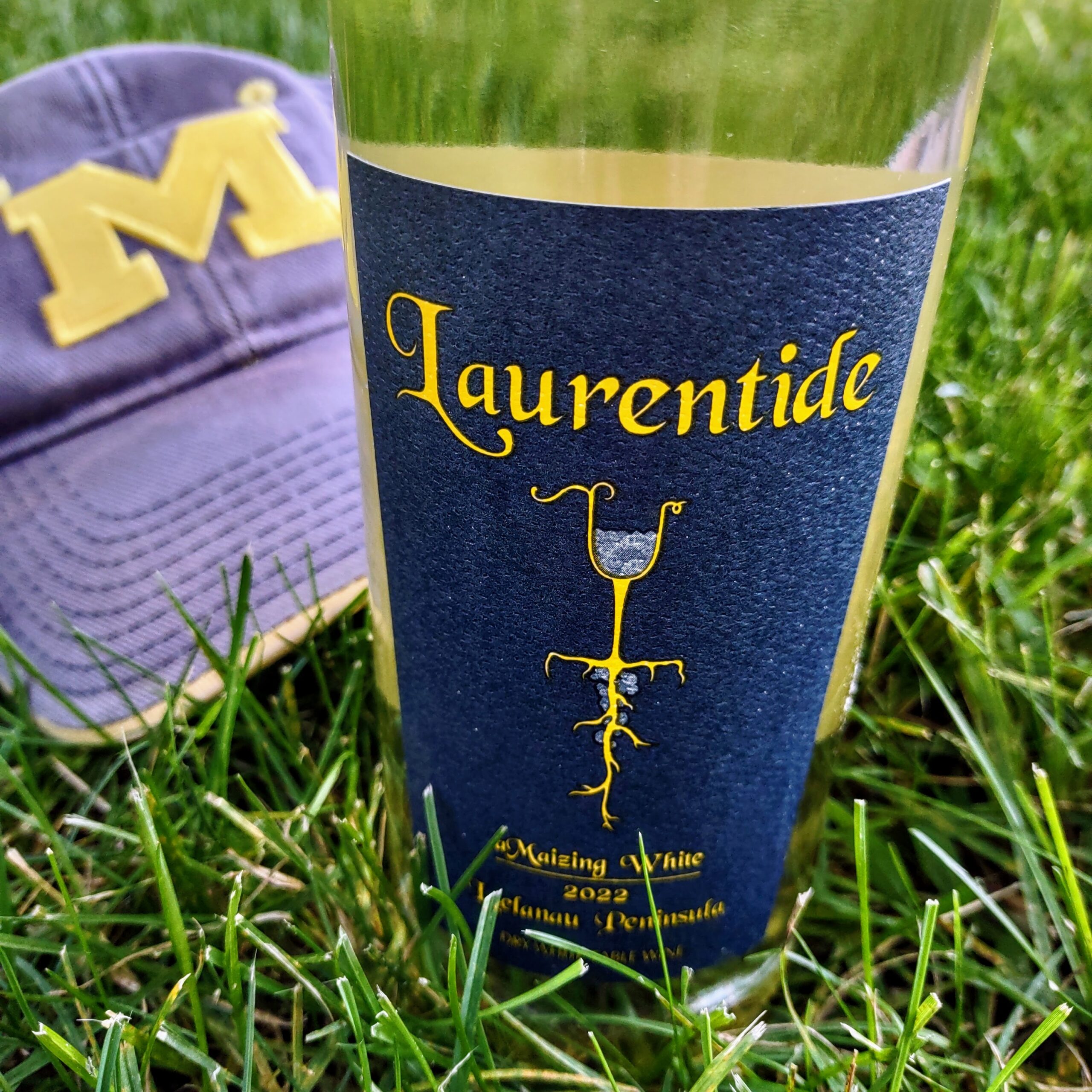 A maize and blue bottle of Laurentide wine