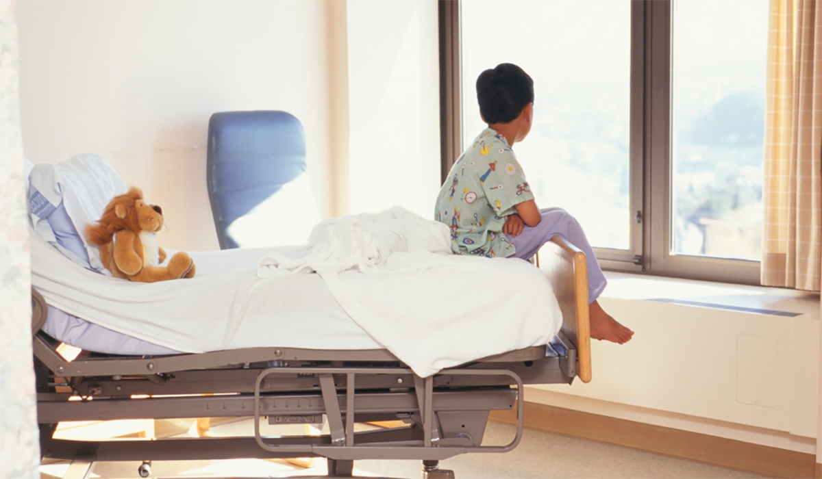 Child Sitting Hospital Bed Window