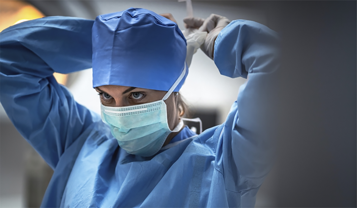 Doctor Surgeon Tying Face Mask