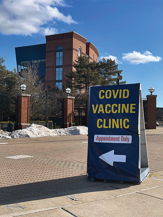 Sign in front of Big House for Vaccines