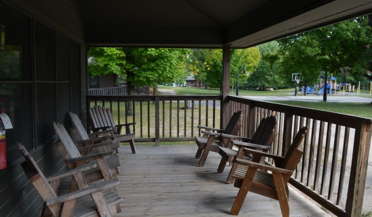 Porch with Adirondack chairs