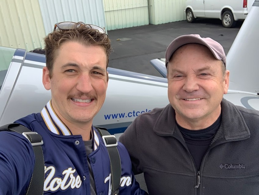 Chuck Coleman and Miles Teller (left), who plays Rooster in “Top Gun: Maverick.”