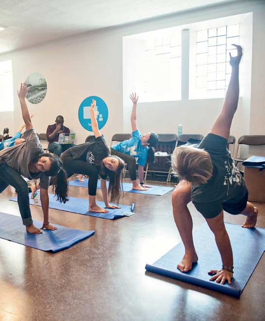 Taking a break from hacking was easy during the 36 hours. Meditation and yoga sessions were held throughout the day. Instructor Mike Dannheim, co-founder of 1Apeiron, leads a group in restorative yoga.