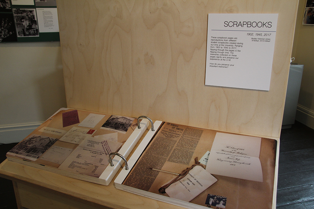 Reproductions of scrapbooks dating from 1902 to 1945 are on display. Flipping through the pages makes one wonder if today’s scrapbook is Facebook.