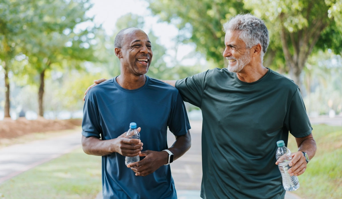 Senior Men Walking Laughing Park