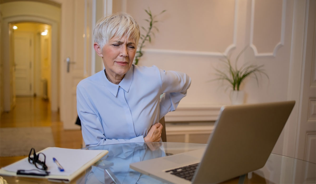 Senior Woman Twisting Pain Grimace