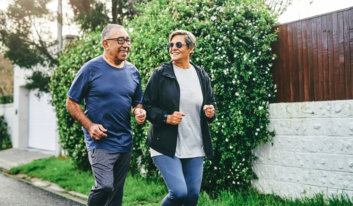 Seniors Exercising Walking Jogging Sidewalk