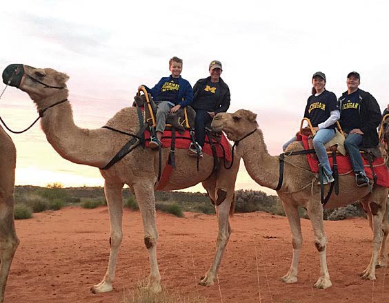 Nathan, ’96, and Rebecca Smith, ’96, took their children, Emma and Sam, on a partly camel-driven trip to Australia’s Uluru/Ayers Rock in June.
