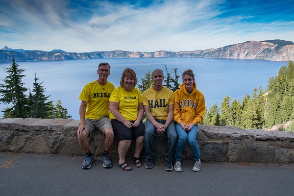 Steve Soper, ’77, MD’81, Ann Soper, MSW’80, their son Josh Soper, ’06, and Kate Dillon, ’06, enjoyed a long-awaited trip to Oregon’s Crater Lake in August. Their visit included a hike up the neighboring Mount Scott, the highest peak near the lake. No rivers or streams run into or out of Crater Lake, resulting in immaculate water quality.