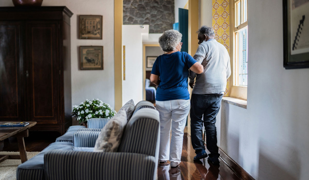 V2senior Couple Woman Helping Man