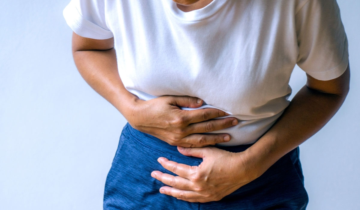 Woman Holding Abdomen Stomach Uterus 1