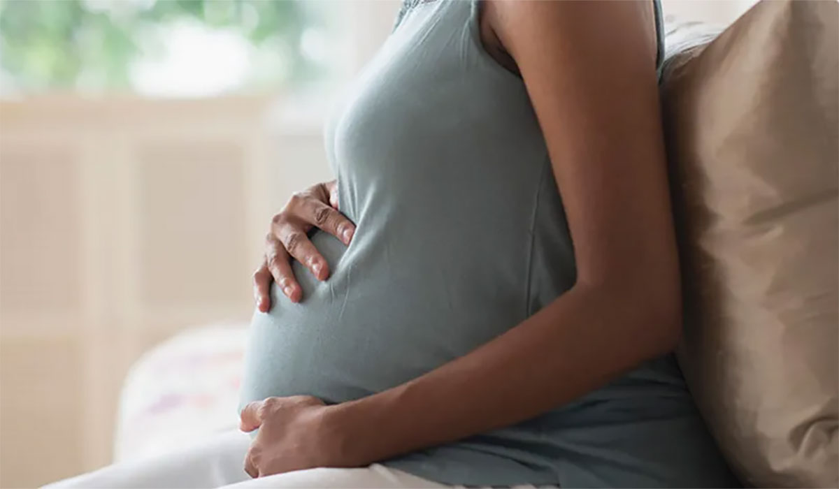 Woman Pregnancy Couch Maternal Disparities (1)