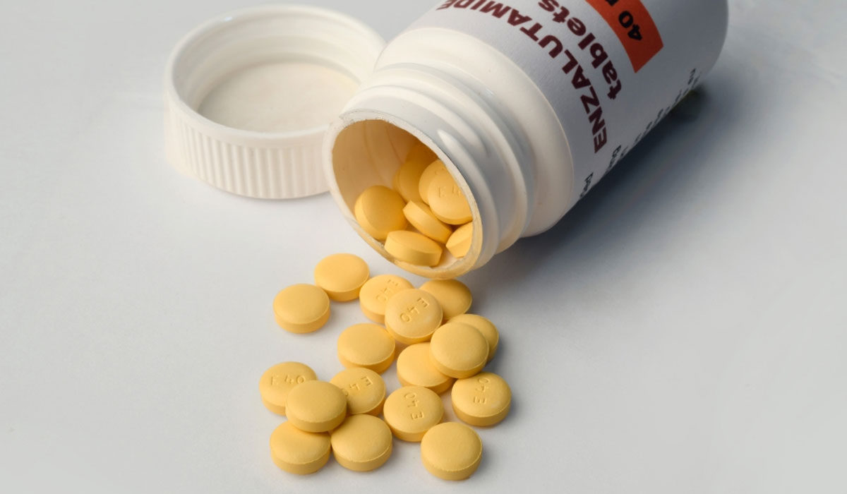 Yellow Pills Spilling From Bottle 0